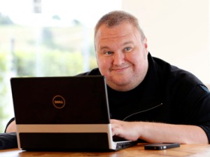 Kim Dotcom smiles during an interview with Reuters in Auckland